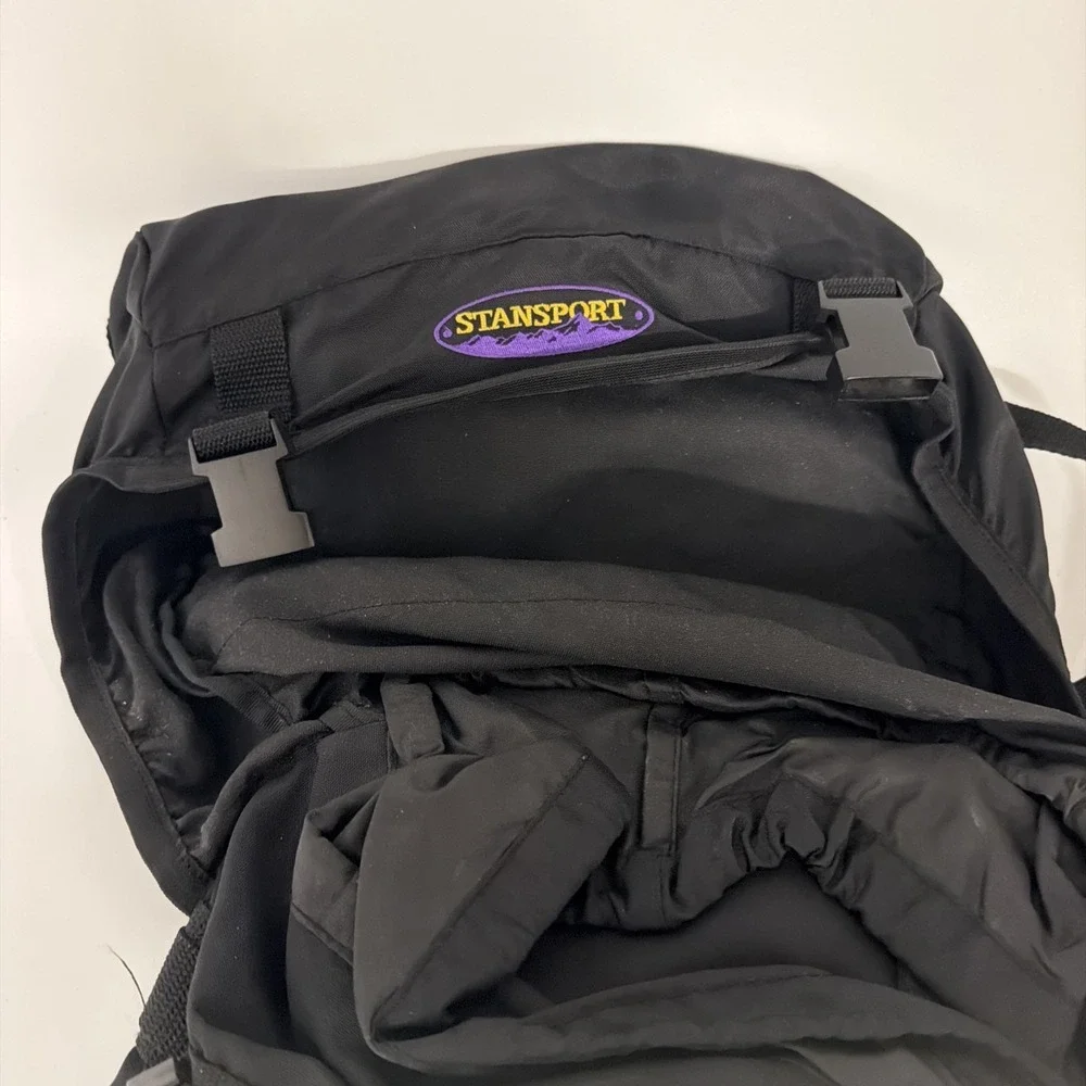 black Stansport hiking backpack features external adjustable straps